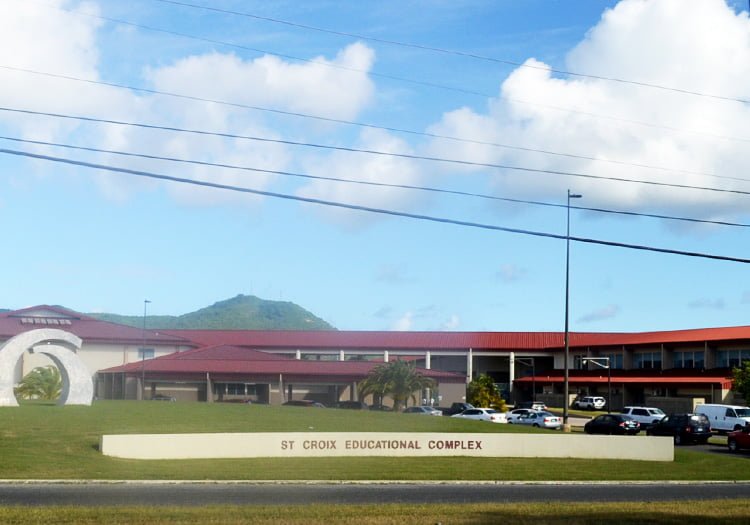 St. Croix Educational Complex seen from the road with a big sign on the grass that says: St. Croix Educational Complex