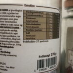Etikette fra den Limbiske Fabrik der viser ingredienser til Emotion